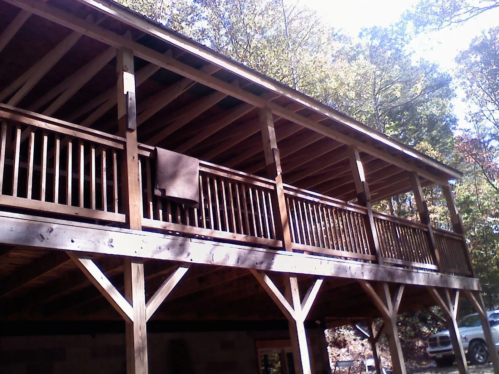 Timber framing under a new elevated porch and deck — Roof Leak Repair in Forest Ranch by Roofing Brothers